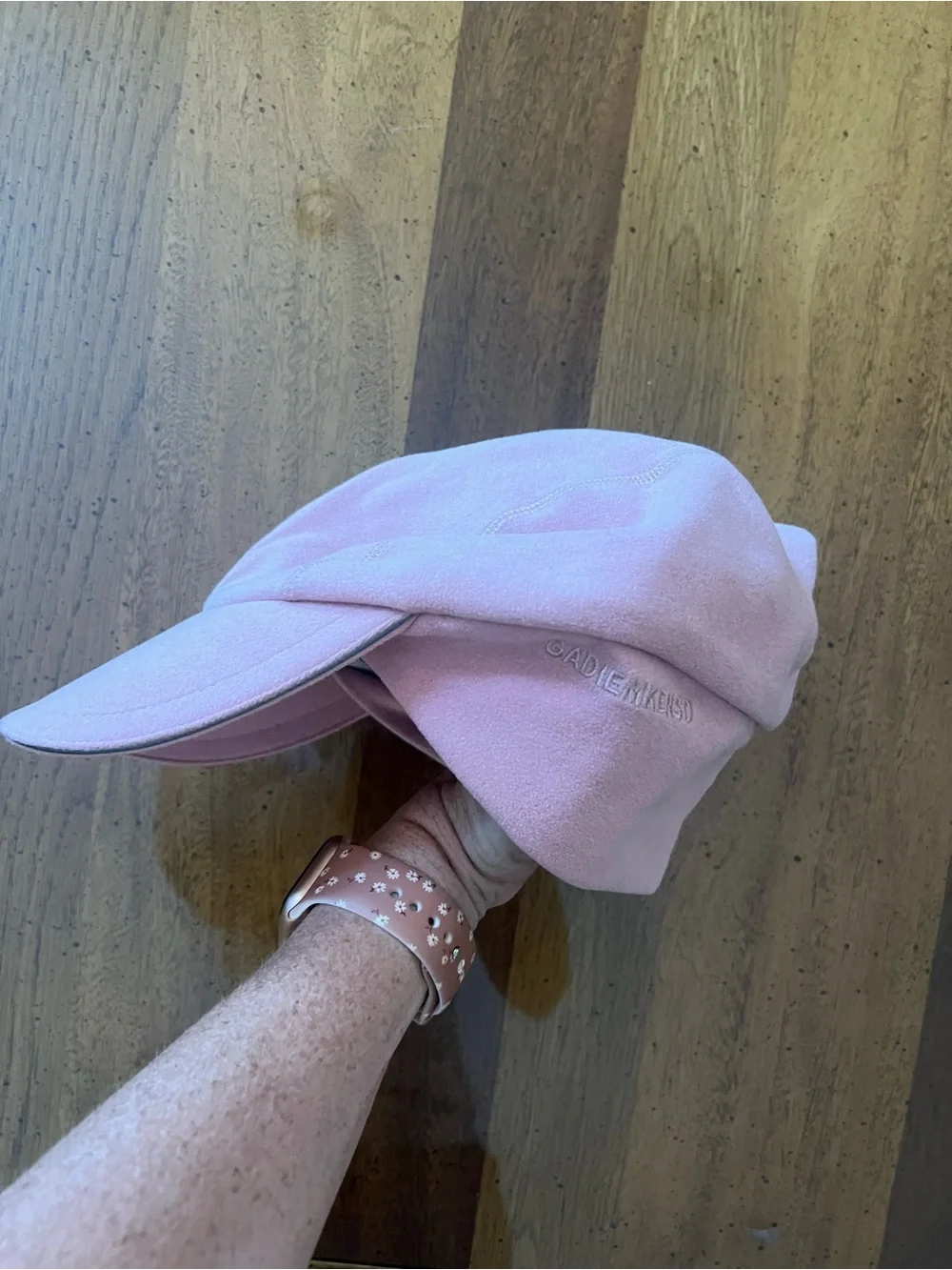 Pink fleece winter hat with ear covers